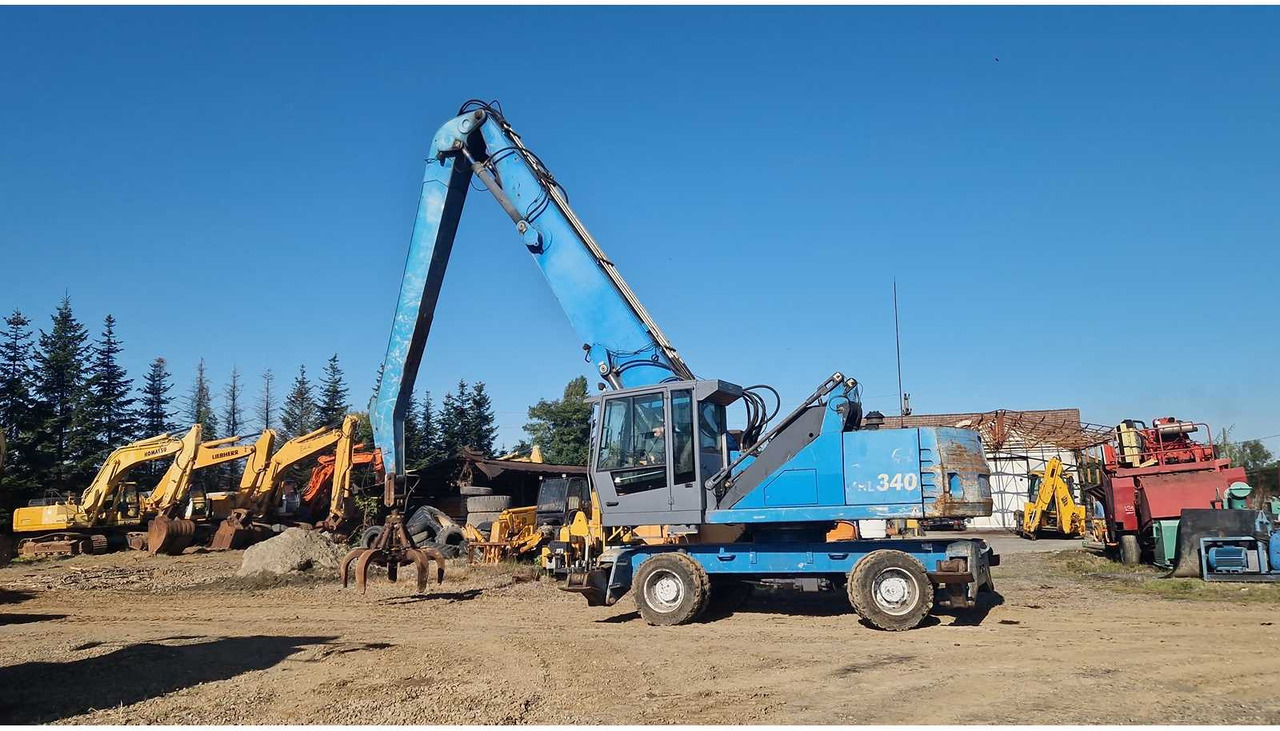 TEREX FUCHS MHL 340 - حفار ذو عجلات: صورة 1 TEREX FUCHS MHL 340 - حفار ذو عجلات: صورة 1