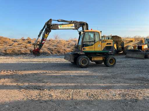 Volvo EXCAVATOR EW140D - حفار ذو عجلات: صورة 2 Volvo EXCAVATOR EW140D - حفار ذو عجلات: صورة 2