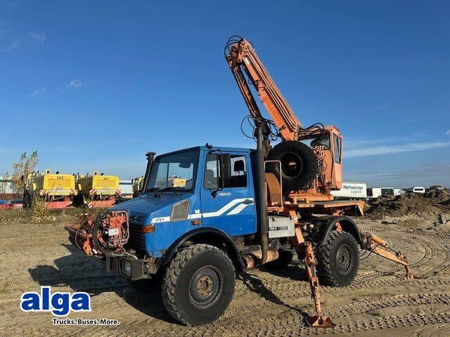 Unimog U 1450 4x4, Zug & Bergwinde, Kran, Greifer, AH - آلات الإنشاء: صورة 1 Unimog U 1450 4x4, Zug & Bergwinde, Kran, Greifer, AH - آلات الإنشاء: صورة 1