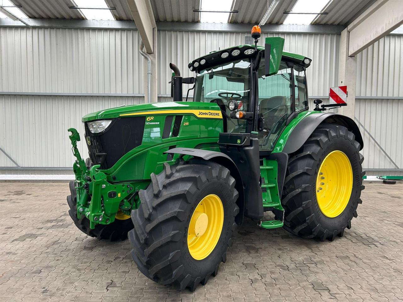 John Deere 6R 215 - جرار: صورة 1 John Deere 6R 215 - جرار: صورة 1