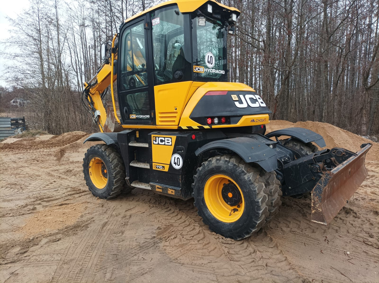 JCB HD110WT T4F - حفار صغير: صورة 1 JCB HD110WT T4F - حفار صغير: صورة 1