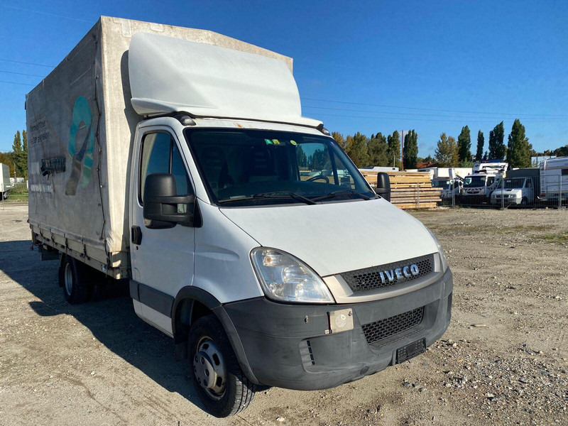 Iveco Daily 35 C 18 Pritsche + Plane + DHollandia LBW - 3,5t - شاحنة مغلقة بستائر جانبية: صورة 1 Iveco Daily 35 C 18 Pritsche + Plane + DHollandia LBW - 3,5t - شاحنة مغلقة بستائر جانبية: صورة 1