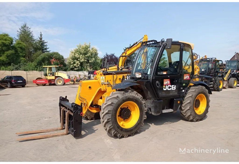 JCB 535-95 Telescopic basket lift - منصة جومحمولةية: صورة 1 JCB 535-95 Telescopic basket lift - منصة جومحمولةية: صورة 1