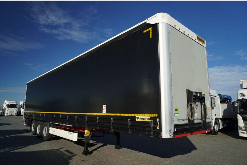 Wielton FIRANKA STANDARD / MULDA DO STALI - 9 M / OŚ PODNOSZONA / SAF / - نصف مقطورة بستائر جانبية: صورة 2 Wielton FIRANKA STANDARD / MULDA DO STALI - 9 M / OŚ PODNOSZONA / SAF / - نصف مقطورة بستائر جانبية: صورة 2