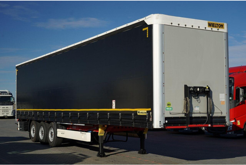 Wielton FIRANKA STANDARD / MULDA DO STALI - 9 M / OŚ PODNOSZONA / SAF / - نصف مقطورة بستائر جانبية: صورة 1 Wielton FIRANKA STANDARD / MULDA DO STALI - 9 M / OŚ PODNOSZONA / SAF / - نصف مقطورة بستائر جانبية: صورة 1