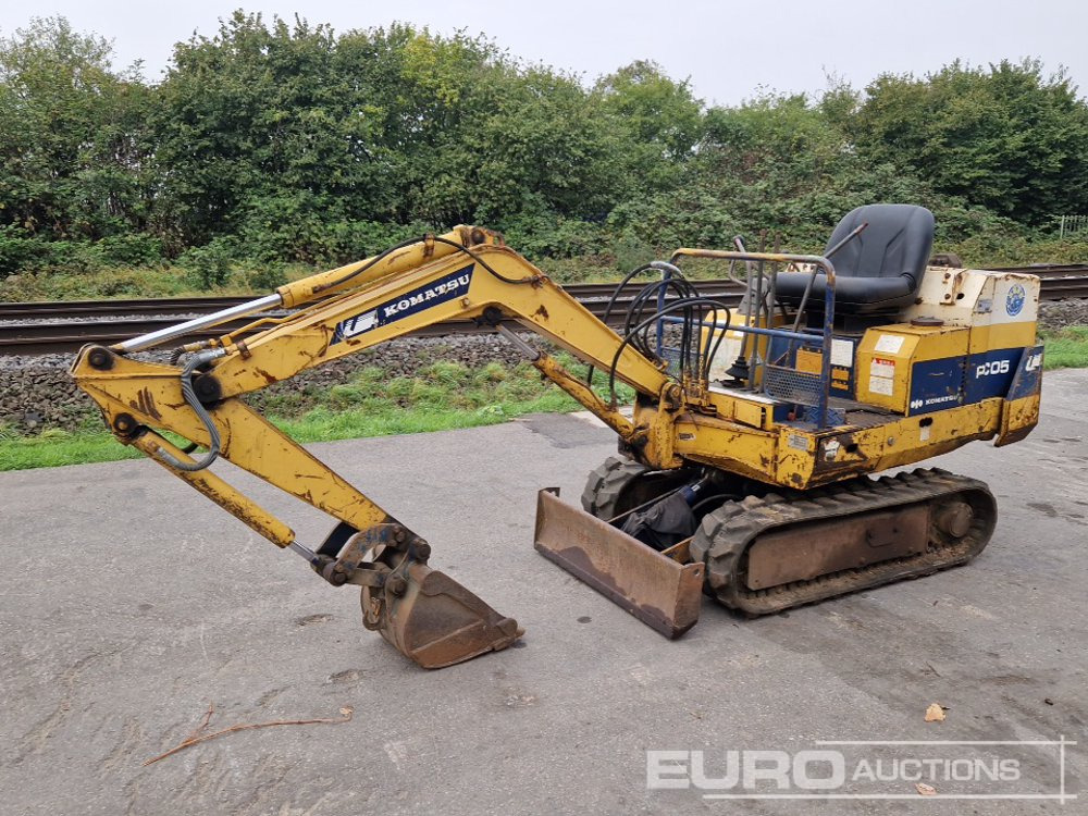 Komatsu PC05-6 - حفار صغير: صورة 1 Komatsu PC05-6 - حفار صغير: صورة 1