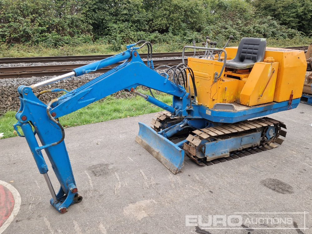 Komatsu PC05 - حفار صغير: صورة 1 Komatsu PC05 - حفار صغير: صورة 1