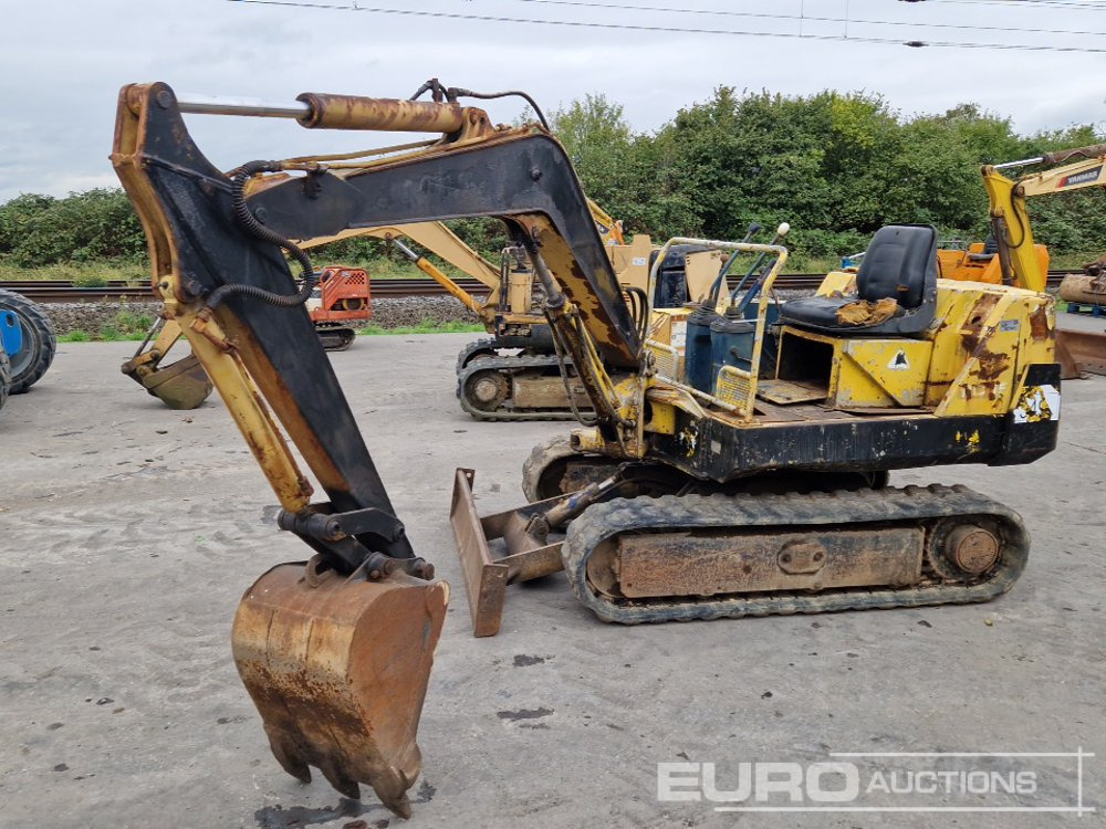 Komatsu PC15 - حفار صغير: صورة 1 Komatsu PC15 - حفار صغير: صورة 1