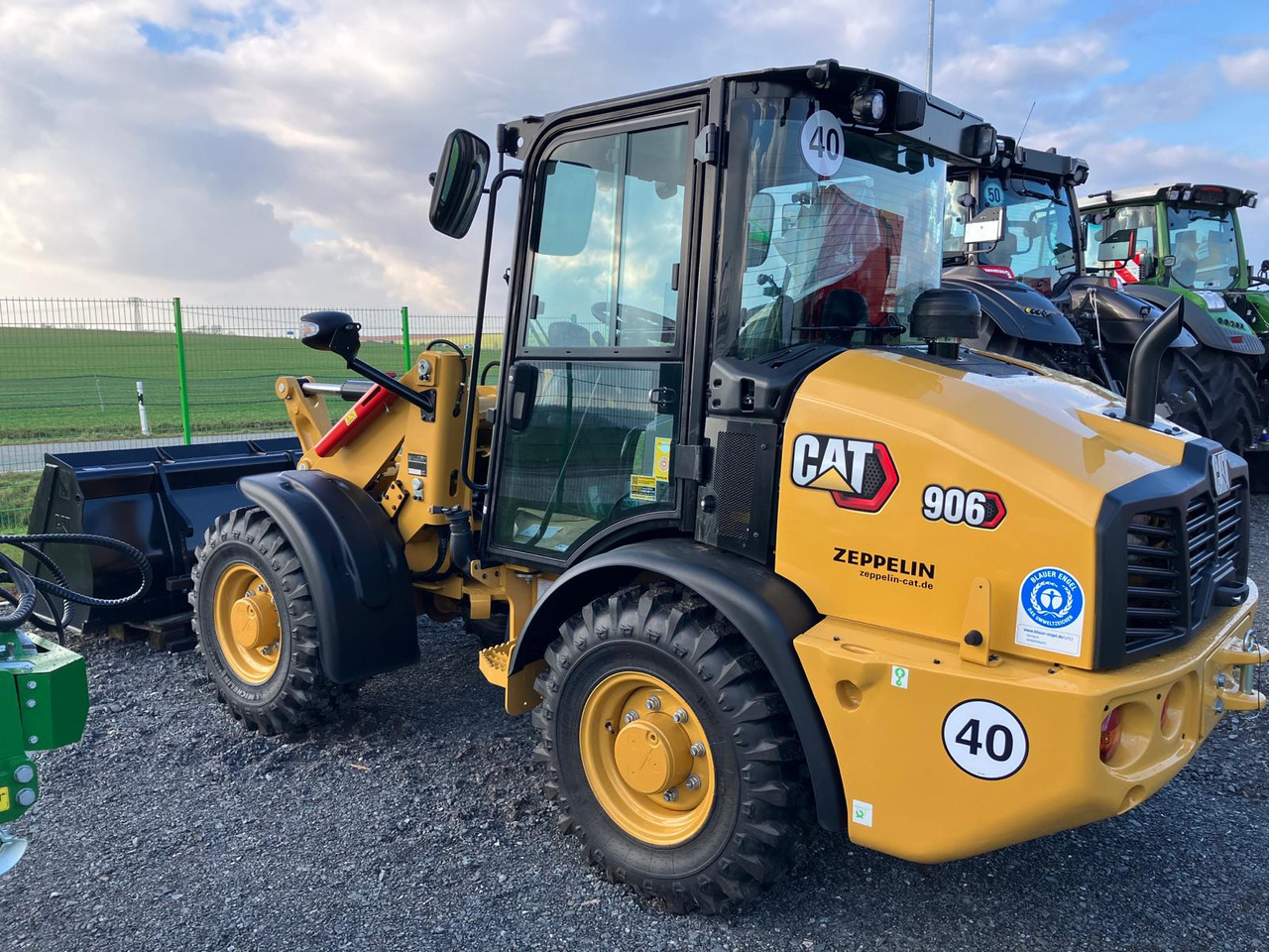 Caterpillar 906 - اللودر بعجل: صورة 3 Caterpillar 906 - اللودر بعجل: صورة 3
