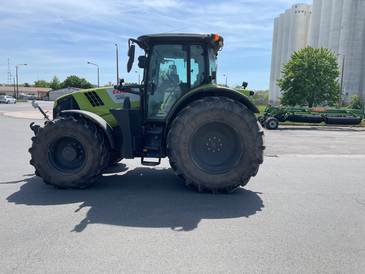 Claas Arion 660 C-matic - جرار: صورة 1 Claas Arion 660 C-matic - جرار: صورة 1