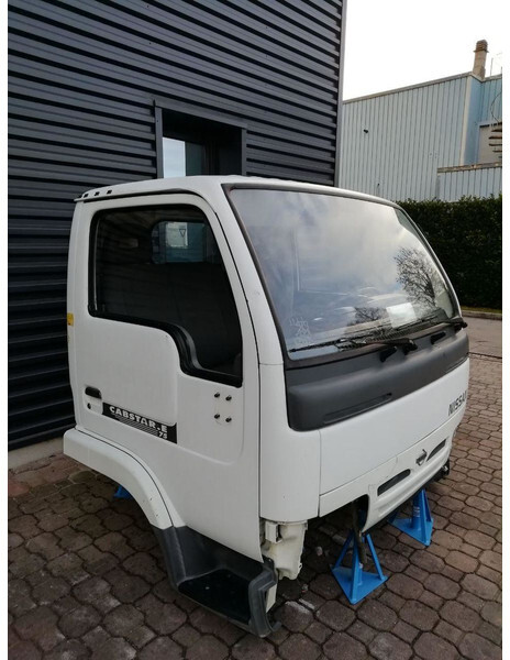 Nissan CABSTAR (1996-2006) - الكابينة والداخلية - شاحنة: صورة 3 Nissan CABSTAR (1996-2006) - الكابينة والداخلية - شاحنة: صورة 3