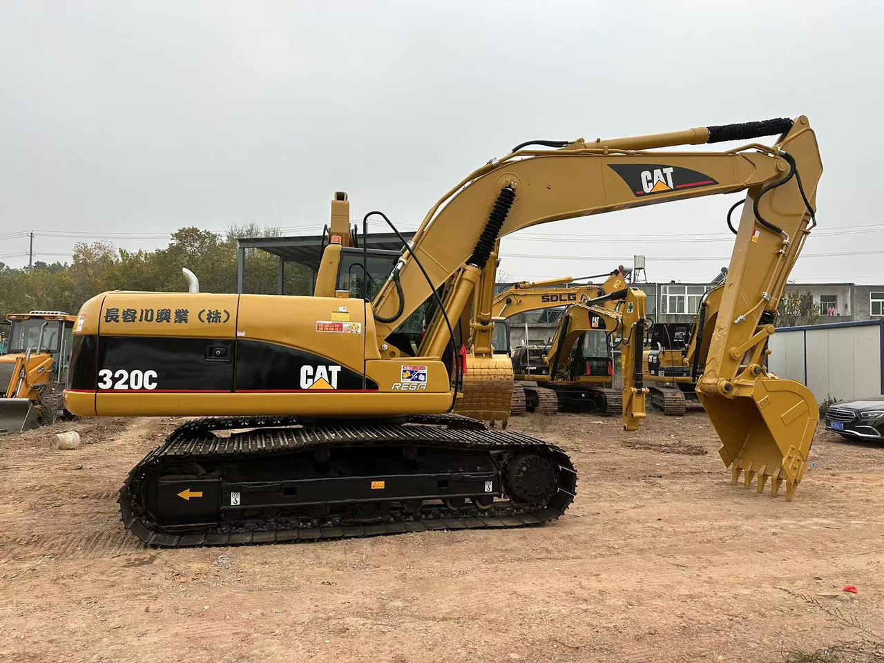 CATERPILLAR 320CL - حفار زاحف: صورة 1 CATERPILLAR 320CL - حفار زاحف: صورة 1