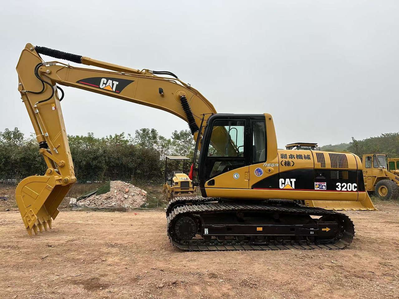CATERPILLAR 320CL - حفار زاحف: صورة 1 CATERPILLAR 320CL - حفار زاحف: صورة 1