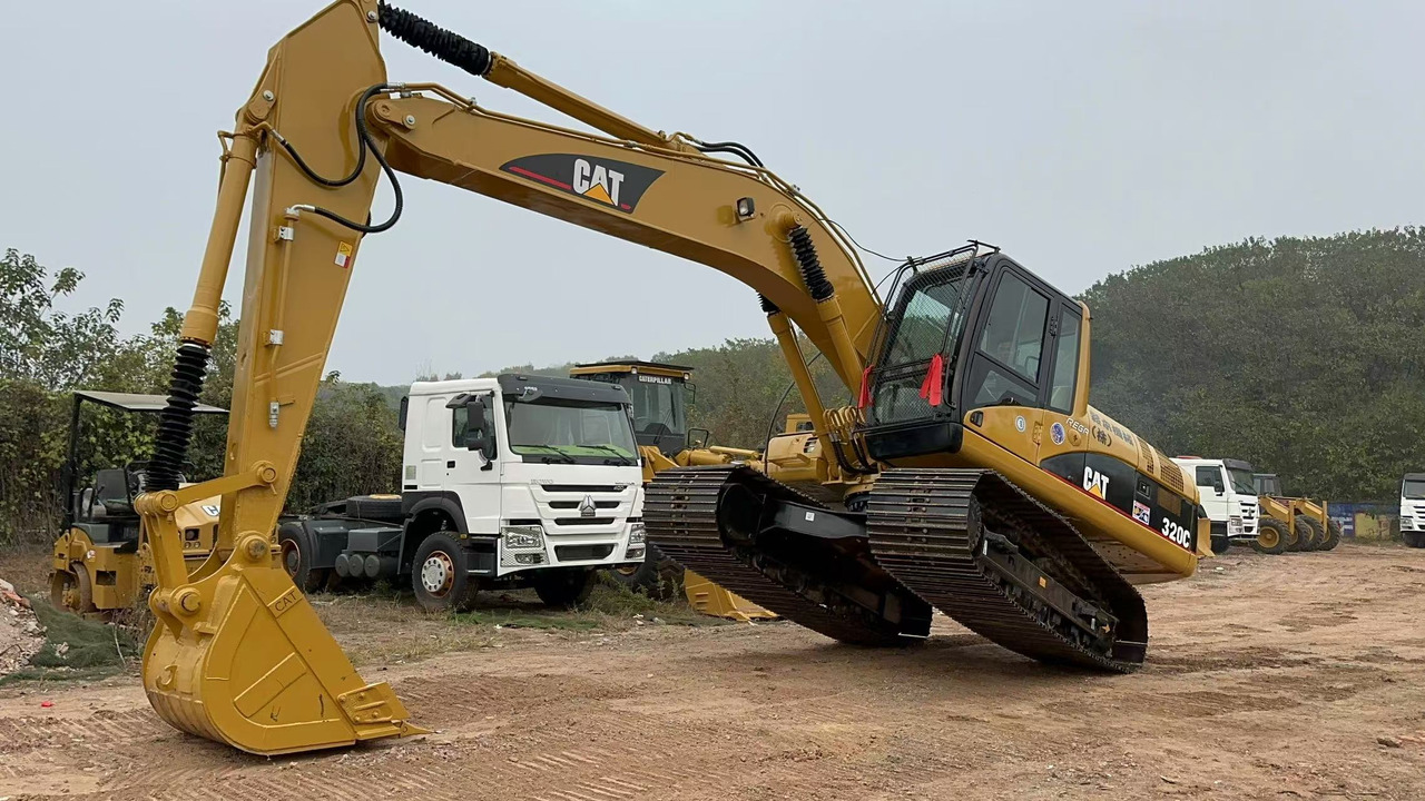 CATERPILLAR 320CL - حفار زاحف: صورة 1 CATERPILLAR 320CL - حفار زاحف: صورة 1