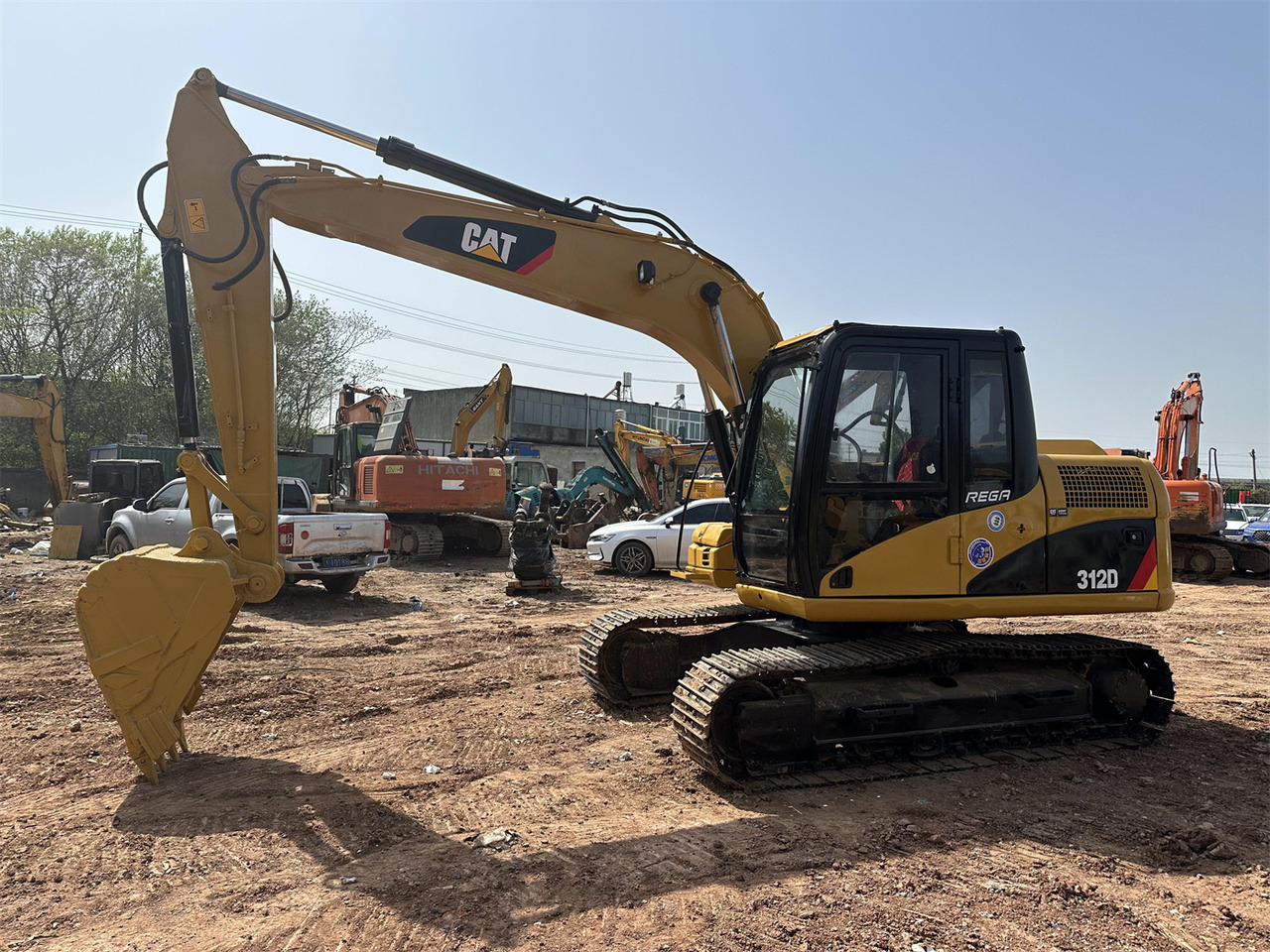 Caterpillar 312D - حفار صغير: صورة 1 Caterpillar 312D - حفار صغير: صورة 1