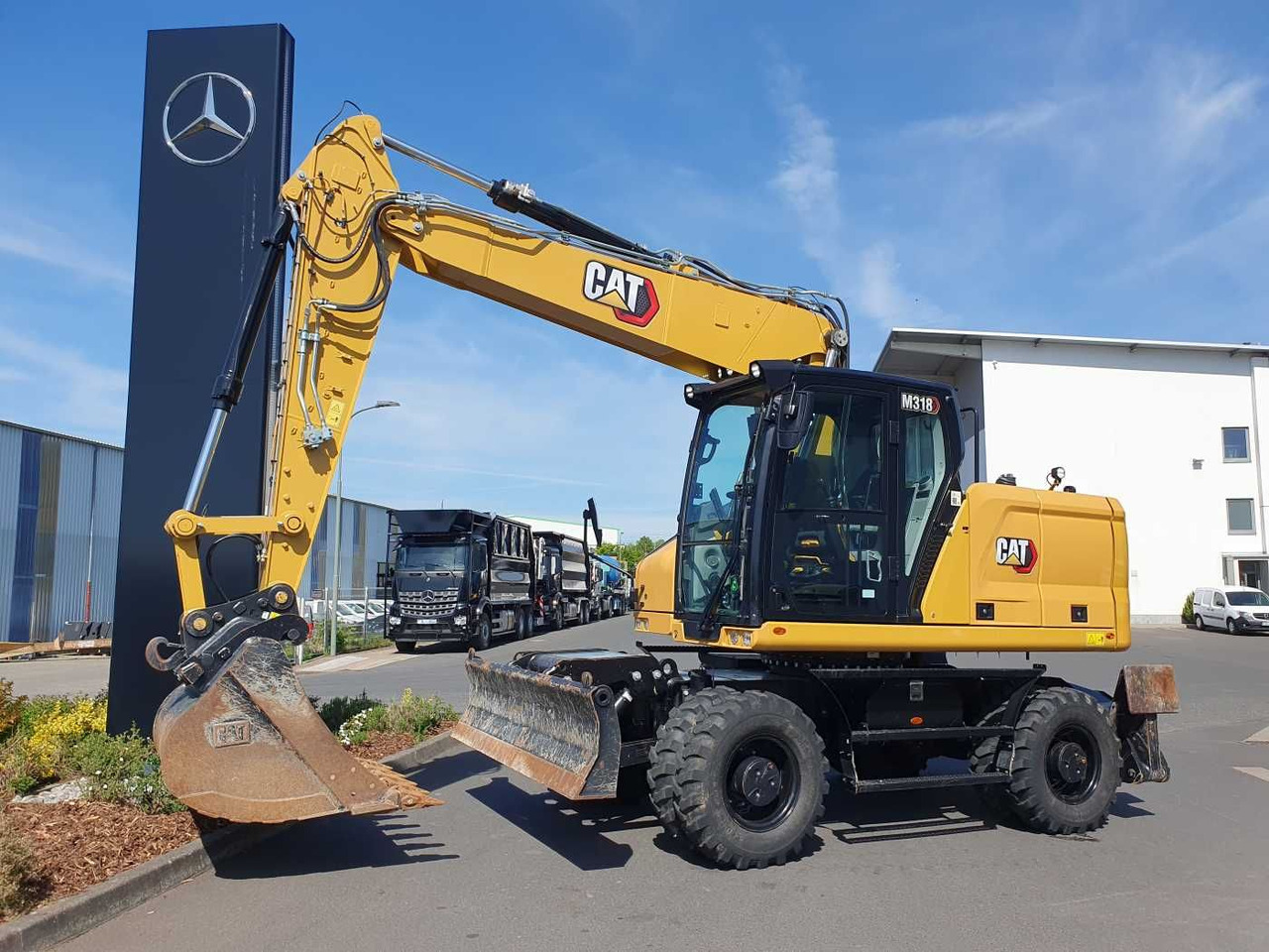 CAT M318 / 2022 / nur 286h! / Tieflöffel / Pratzen - حفار ذو عجلات: صورة 1 CAT M318 / 2022 / nur 286h! / Tieflöffel / Pratzen - حفار ذو عجلات: صورة 1
