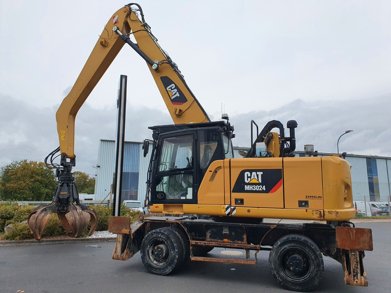 CAT MH3024 / MH 3024 / Greifer / 2018 / 9.424h - حفار ذو عجلات: صورة 4 CAT MH3024 / MH 3024 / Greifer / 2018 / 9.424h - حفار ذو عجلات: صورة 4