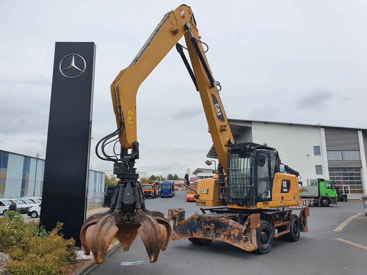 CAT MH3024 / MH 3024 / Greifer / 2018 / 9.424h - حفار ذو عجلات: صورة 1 CAT MH3024 / MH 3024 / Greifer / 2018 / 9.424h - حفار ذو عجلات: صورة 1