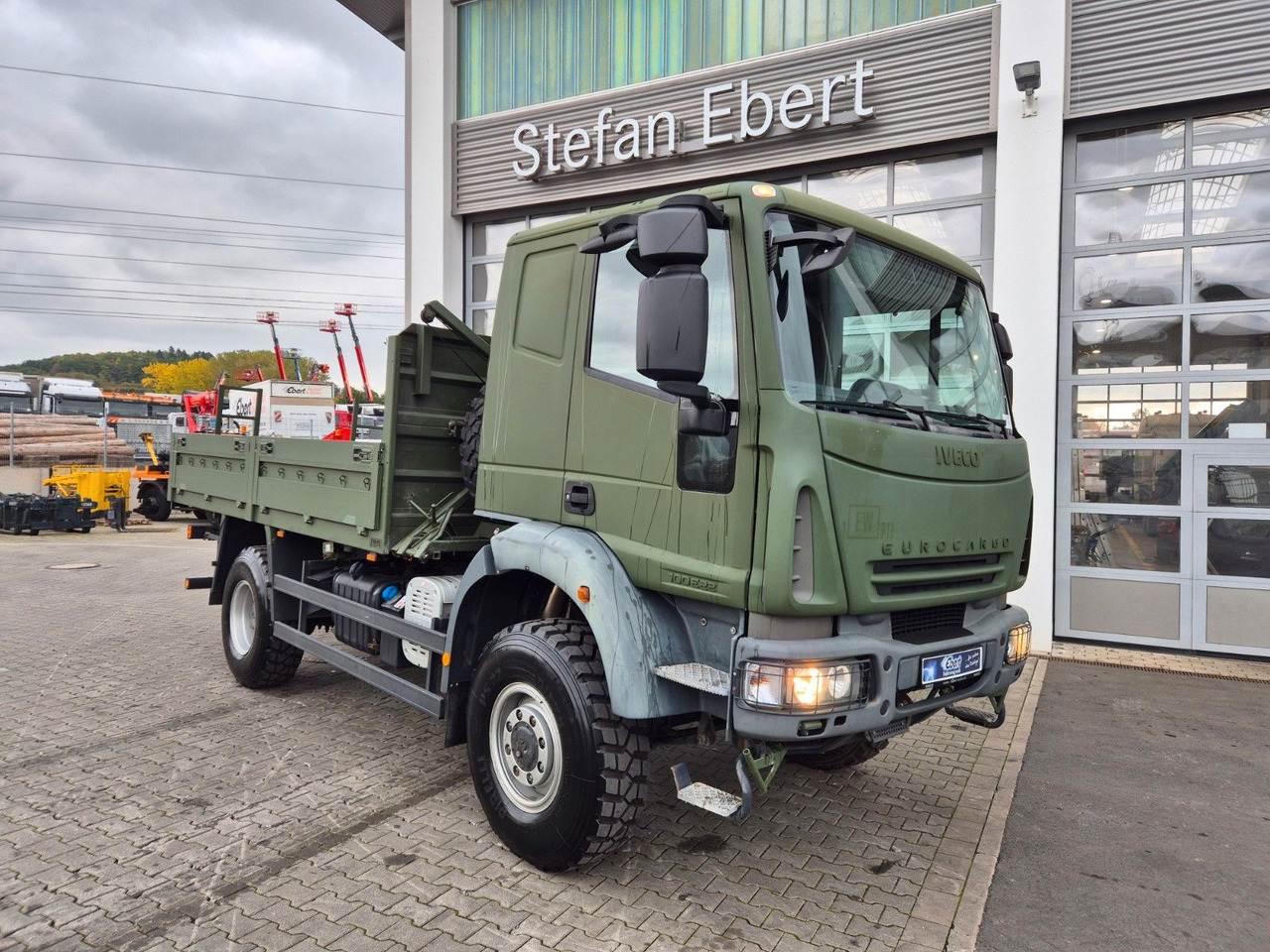 Iveco Eurocargo ML100E22WM-BW 4x4 Pritsche L-Haus Bett - شاحنات مسطحة: صورة 2 Iveco Eurocargo ML100E22WM-BW 4x4 Pritsche L-Haus Bett - شاحنات مسطحة: صورة 2