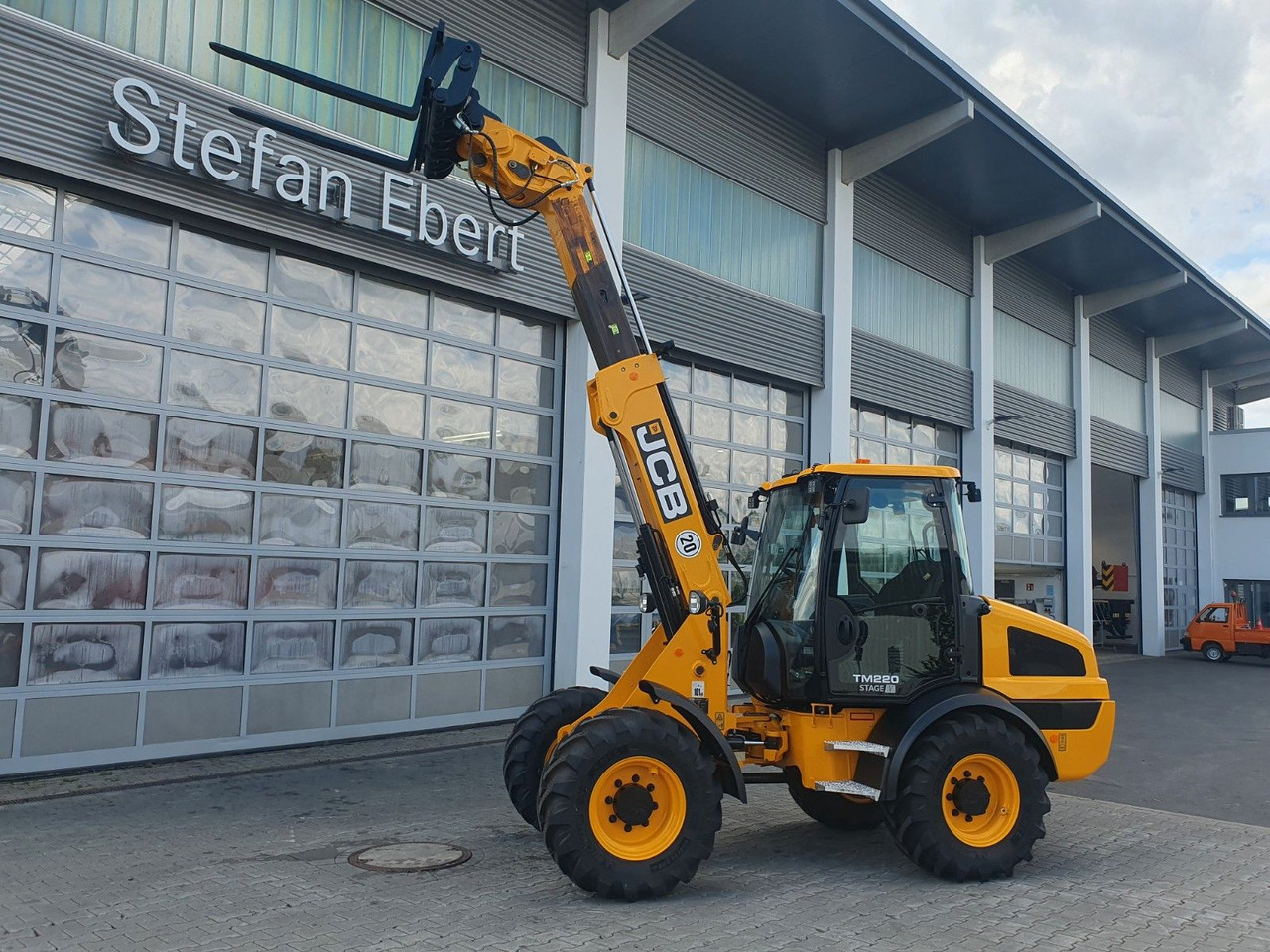 JCB TM 220 SV C / Neufahrzeug / Teleskop / Gabel - اللودر بعجل: صورة 1 JCB TM 220 SV C / Neufahrzeug / Teleskop / Gabel - اللودر بعجل: صورة 1