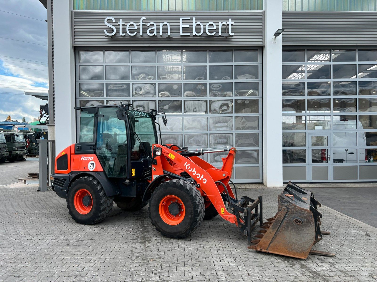 Kubota R070 / Gabel & Schaufel / nur 1.869h! - اللودر بعجل: صورة 1 Kubota R070 / Gabel & Schaufel / nur 1.869h! - اللودر بعجل: صورة 1