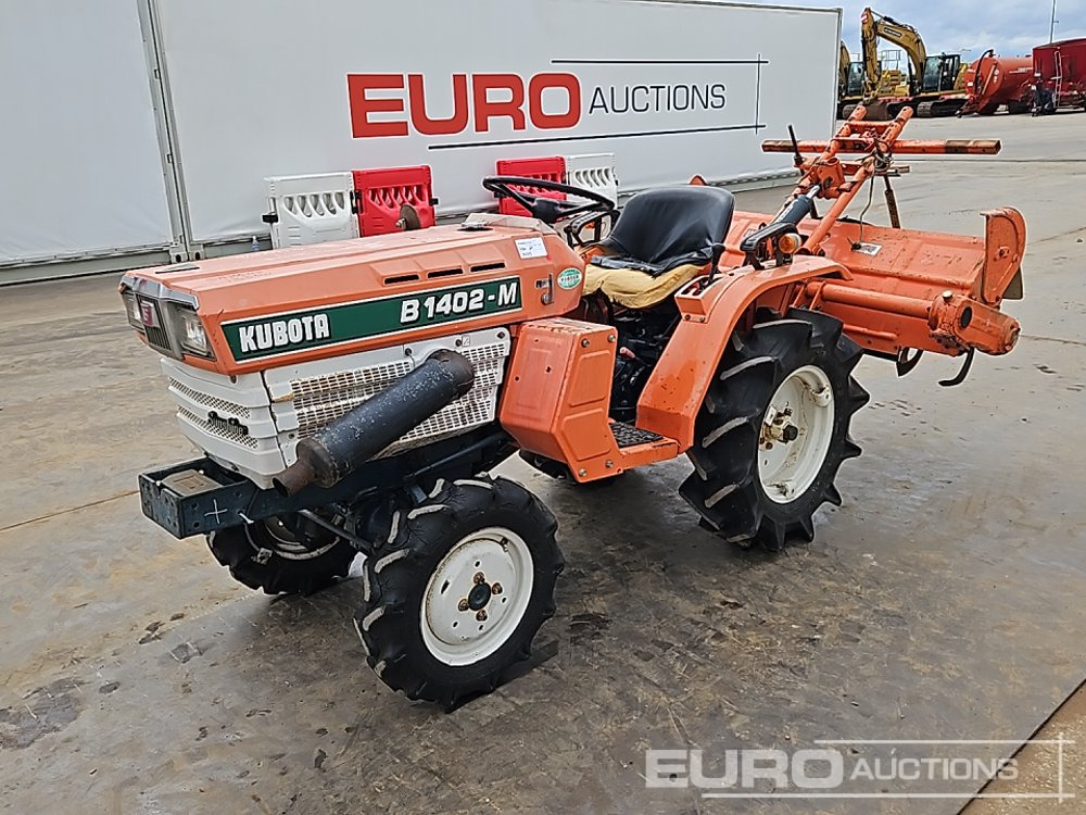 Kubota B1402-M - جرار صغير: صورة 1 Kubota B1402-M - جرار صغير: صورة 1