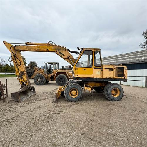 Massey Ferguson W350 C - حفار ذو عجلات: صورة 1 Massey Ferguson W350 C - حفار ذو عجلات: صورة 1