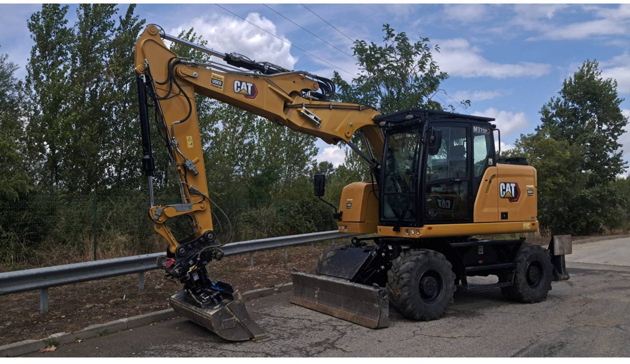 CAT M315F IVC - حفار ذو عجلات: صورة 1 CAT M315F IVC - حفار ذو عجلات: صورة 1