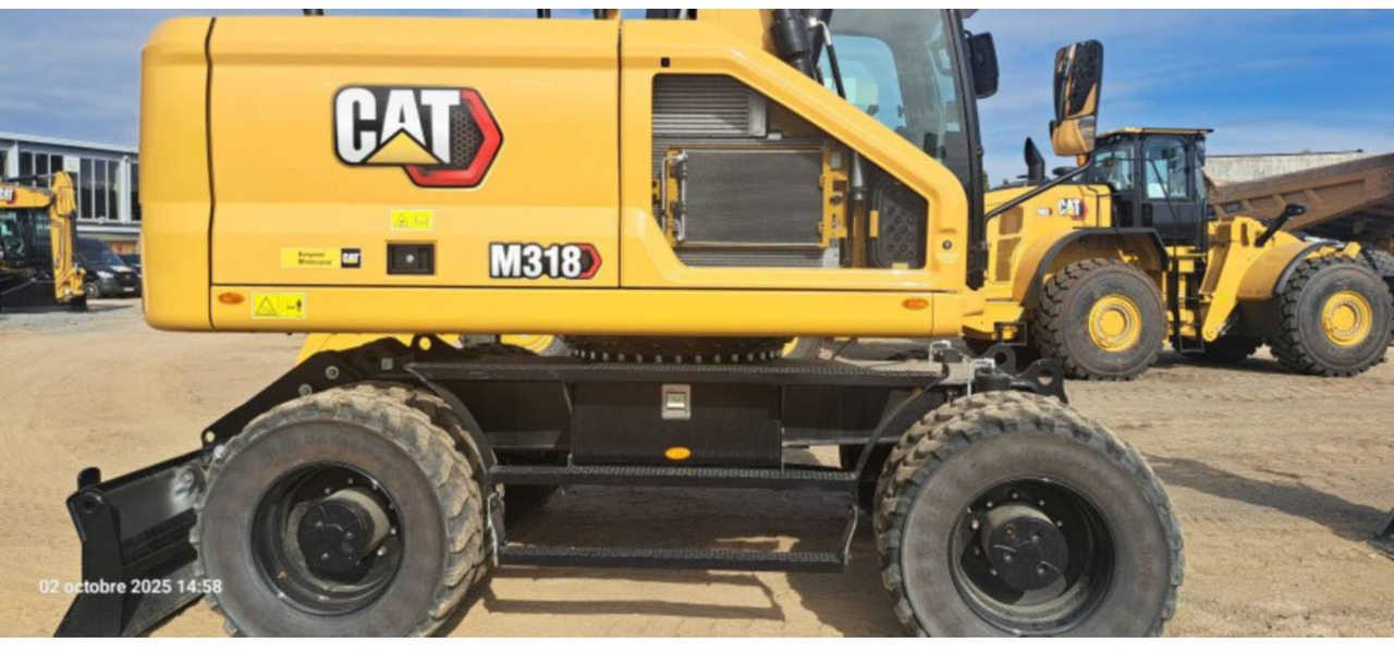 حفار ذو عجلات CAT M318-07: صورة 10