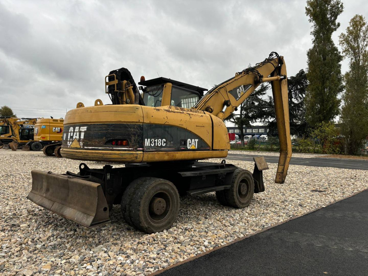 CAT M318C - حفار ذو عجلات: صورة 4 CAT M318C - حفار ذو عجلات: صورة 4