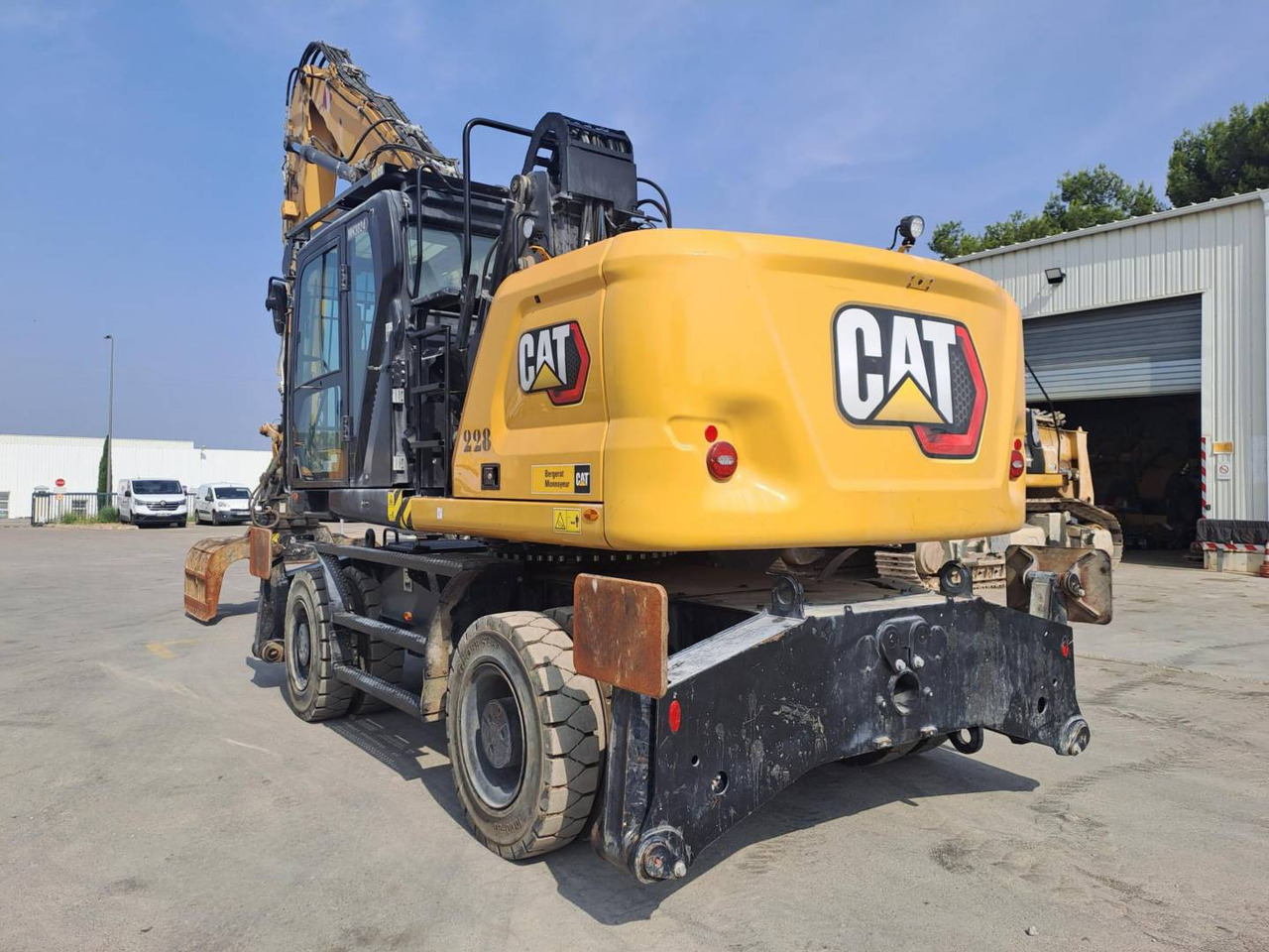 CAT MH3024 - حفار ذو عجلات: صورة 2 CAT MH3024 - حفار ذو عجلات: صورة 2