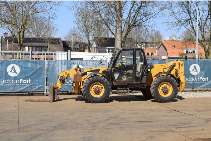 Caterpillar TH514 - آلة رفع ونقل تلسكوبية: صورة 1 Caterpillar TH514 - آلة رفع ونقل تلسكوبية: صورة 1