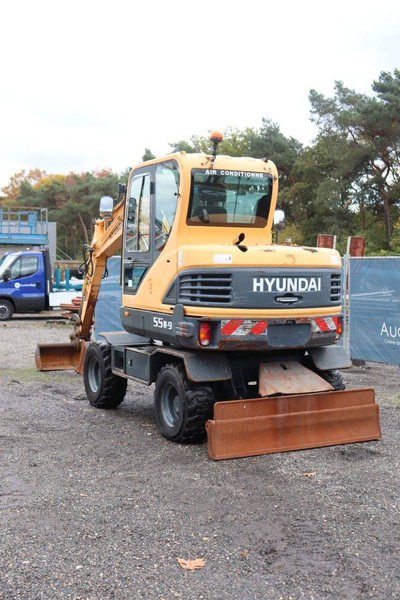 Hyundai 55W-9 - حفار ذو عجلات: صورة 4 Hyundai 55W-9 - حفار ذو عجلات: صورة 4