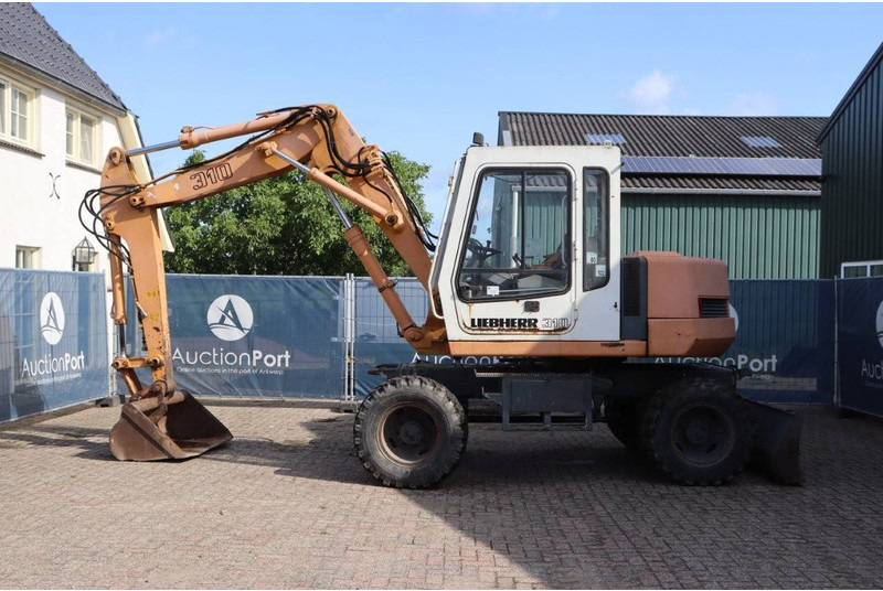 Liebherr A 310 - حفار ذو عجلات: صورة 2 Liebherr A 310 - حفار ذو عجلات: صورة 2