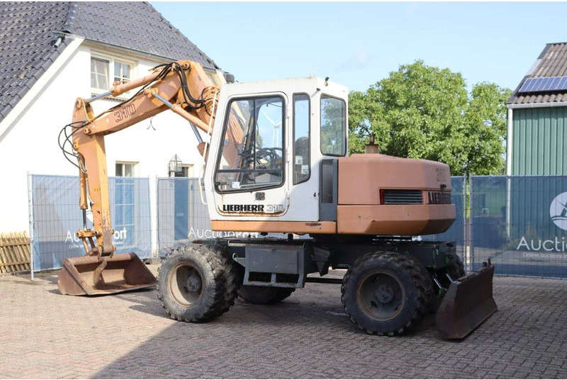 Liebherr A 310 - حفار ذو عجلات: صورة 3 Liebherr A 310 - حفار ذو عجلات: صورة 3