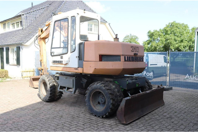Liebherr A 310 - حفار ذو عجلات: صورة 4 Liebherr A 310 - حفار ذو عجلات: صورة 4