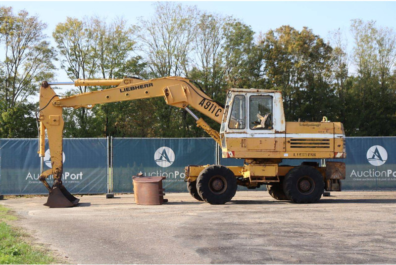 Liebherr A911C - حفار ذو عجلات: صورة 1 Liebherr A911C - حفار ذو عجلات: صورة 1