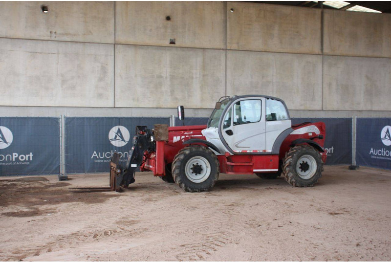 Manitou MT 1440 - آلة رفع ونقل تلسكوبية: صورة 1 Manitou MT 1440 - آلة رفع ونقل تلسكوبية: صورة 1