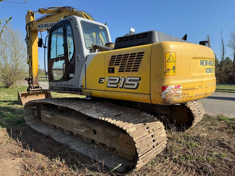 New Holland E215 - حفار زاحف: صورة 2 New Holland E215 - حفار زاحف: صورة 2