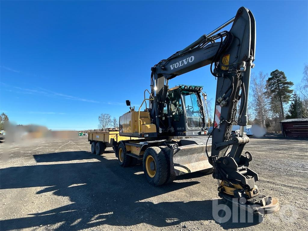 Volvo EW 140C - حفار ذو عجلات: صورة 1 Volvo EW 140C - حفار ذو عجلات: صورة 1