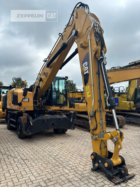 Cat MH3022-06C - آلة التعامل مع النفايات: صورة 1 Cat MH3022-06C - آلة التعامل مع النفايات: صورة 1