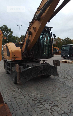 Cat MH3022-07A - آلة التعامل مع النفايات: صورة 2 Cat MH3022-07A - آلة التعامل مع النفايات: صورة 2