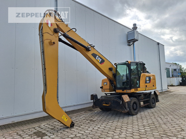 Cat MH3022 - آلة التعامل مع النفايات: صورة 1 Cat MH3022 - آلة التعامل مع النفايات: صورة 1