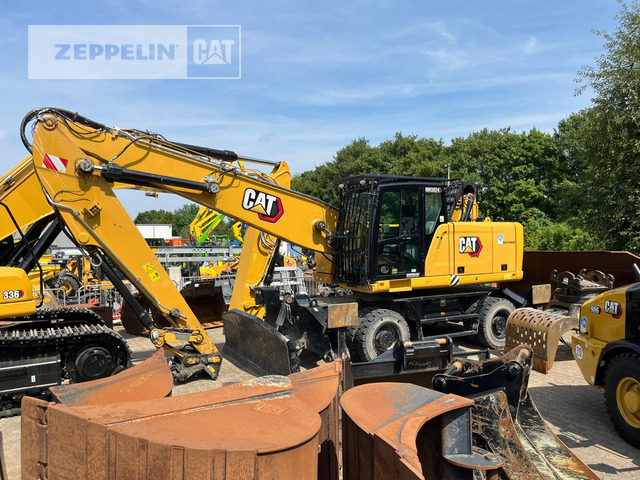 Cat MH3024-06C - آلة التعامل مع النفايات: صورة 1 Cat MH3024-06C - آلة التعامل مع النفايات: صورة 1