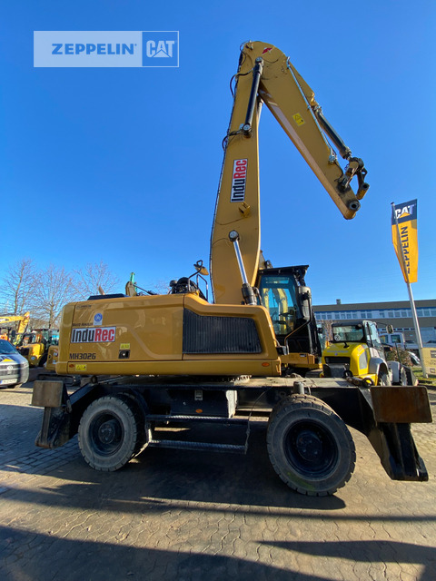Cat MH3026-06C - آلة التعامل مع النفايات: صورة 1 Cat MH3026-06C - آلة التعامل مع النفايات: صورة 1