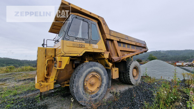 Komatsu HD325-6 - شاحنة قلابة صلبة/ شاحنة صخور: صورة 1 Komatsu HD325-6 - شاحنة قلابة صلبة/ شاحنة صخور: صورة 1
