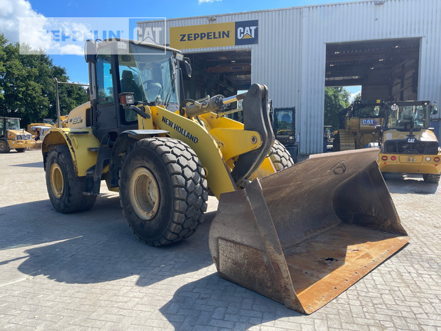 New Holland W190 - اللودر بعجل: صورة 1 New Holland W190 - اللودر بعجل: صورة 1