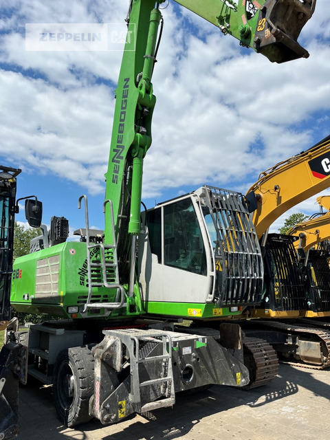 Sennebogen 818 - آلة التعامل مع النفايات: صورة 1 Sennebogen 818 - آلة التعامل مع النفايات: صورة 1
