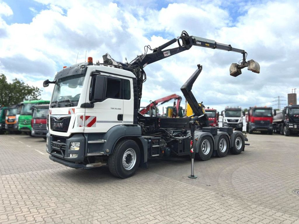 MAN TG-S 35.480 8x4 BL Abrollkipper mit Kran Penz-15 - شاحنة برافعة خطافية, شاحنة كرين: صورة 1 MAN TG-S 35.480 8x4 BL Abrollkipper mit Kran Penz-15 - شاحنة برافعة خطافية, شاحنة كرين: صورة 1