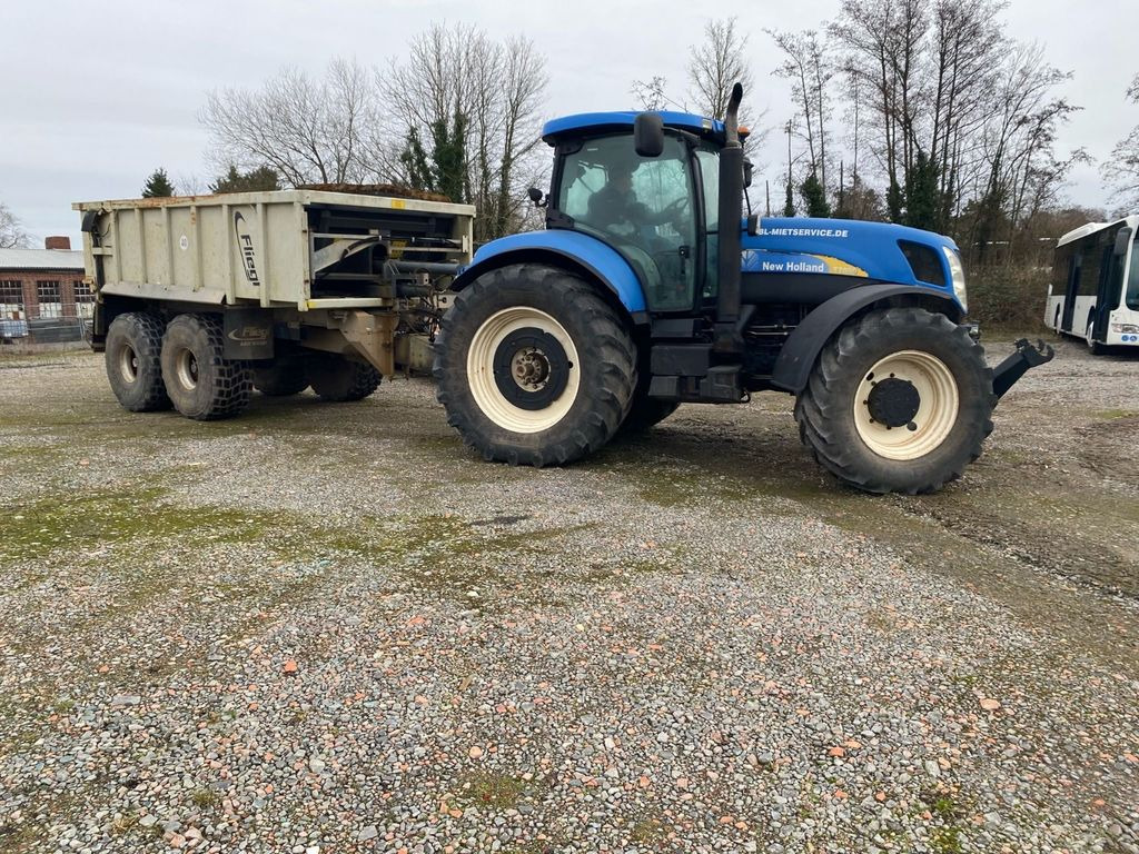 New Holland T7050 (5.638 Betriebs std.) - جرار: صورة 2 New Holland T7050 (5.638 Betriebs std.) - جرار: صورة 2